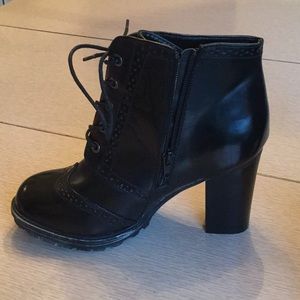 Black combat boots with heel